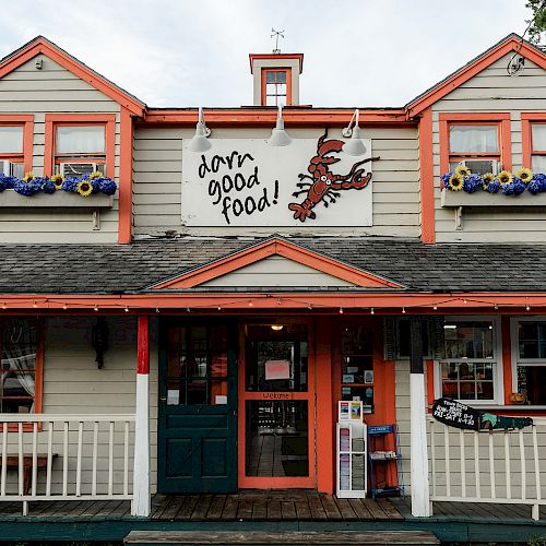 This image shows a charming restaurant with a sign reading 