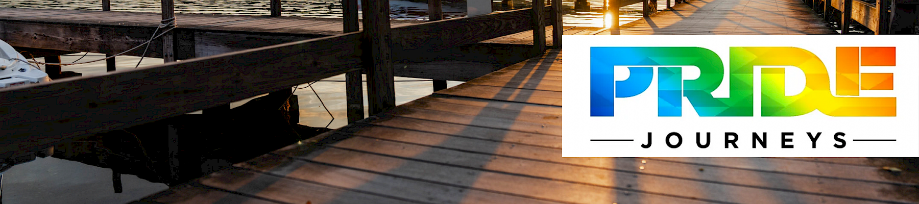 The image shows a wooden dock at sunset with 